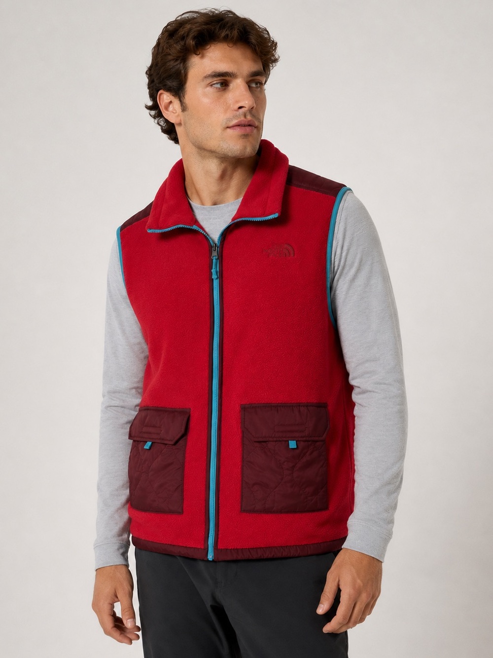 The North Face Men's Red Fleece Vest with Teal Trim and Burgundy Panels